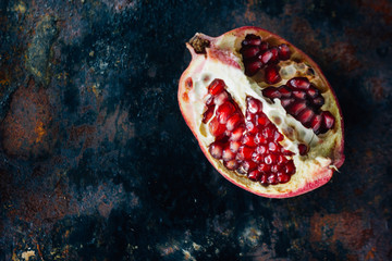 Top view of pomegranate quarter, juicy and sweet.