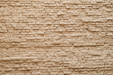 Background of brick wall texture yellow beige.