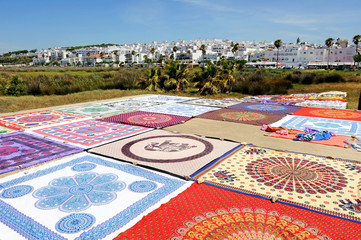 Beach handkerchiefs and sarongs in Conil de la Frontera, famous holiday town on the coast of Cadiz,...