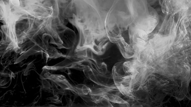 smoke on black background. Black and white abstraction.