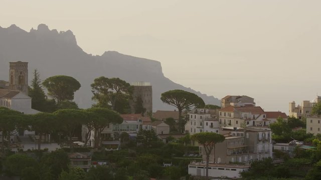 Wide panning shot of waterfront cityscape. Ravello, Campania, Italy