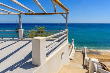 Obraz premium Terrace overlooking the Aegean Sea, Paleochori Beach, Milos. Cyclades Island, Greece.