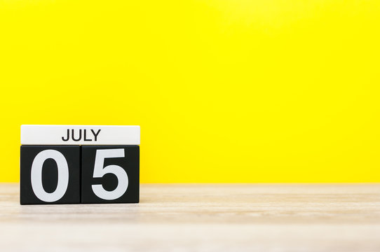 July 5th. Image of july 5, calendar on yellow background. Summer time. With empty space for text