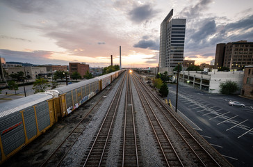 Fototapeta premium Birmingham, Alabama Sunset over railroad tracks