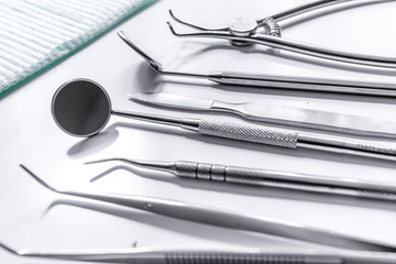 dentist office with tools for teeth care on white background