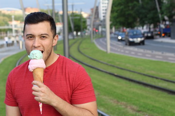 Man licking an ice cream with copy space 
