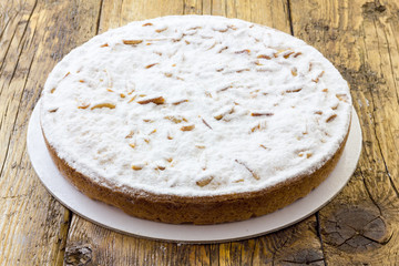 Cream cake with pine nuts