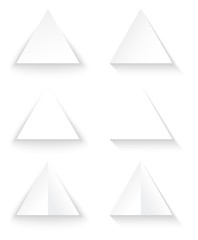 Set of six triangles on a white background with shadows