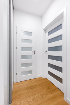 Home corridor with white doors