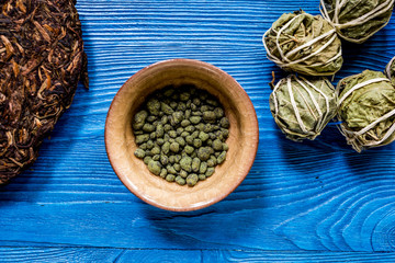 Drink herbal tea with brew blue wooden table background top view