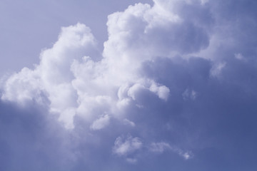 Stormy cloud on sunny sky. Peaceful sky view. Tropical rain season. Moisture concept.