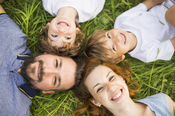 Happy family in the meadow