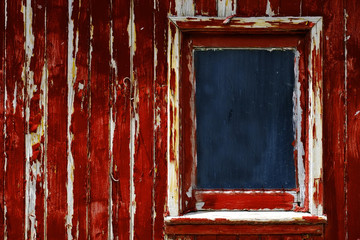 Weathered Red Paint Window on Old Wood