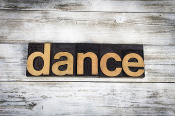 Dance Letterpress Word on Wooden Background
