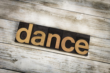 Dance Letterpress Word on Wooden Background