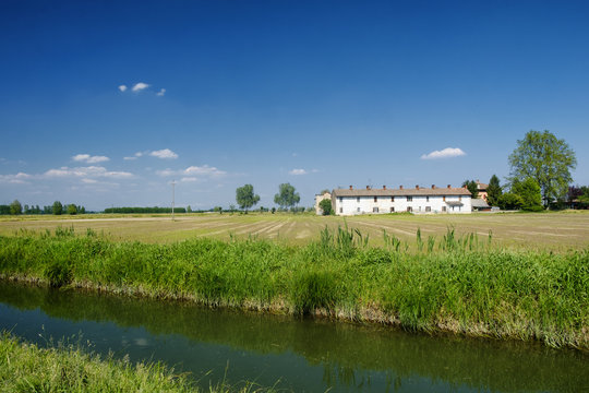 Bicycle lane along the Naviglio of Bereguardo (Italy): farm