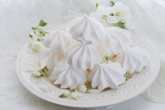 Light air vanilla meringue on a white plate