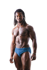 African American bodybuilder man, naked muscular torso, wearing underwear, against black background