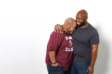 Studio portrait of couple laughing together