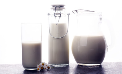 Milk jug and glass milk - healthy lifestyle concept