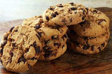 Chocolate cookies on wooden table. Chocolate chip cookies shot
