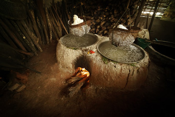Traditional salt making by boiling underground salt water at Bolklua village, Nan province, Thailand
