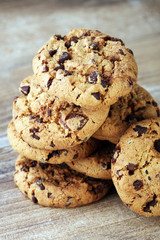 Chocolate cookies on wooden table. Chocolate chip cookies shot