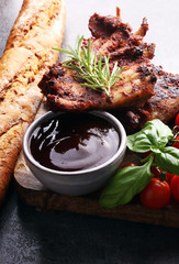 Spicy hot grilled spare ribs from a summer BBQ served with fresh