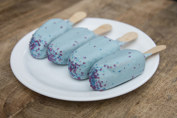 Blue Cakesicles Popsicles  with caramel sparkling 