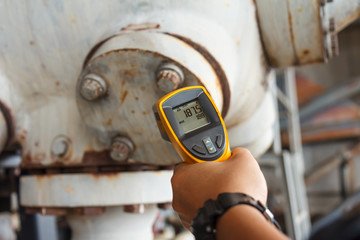 Technician observed and check operating machinery and equipment in sea off shore thailand