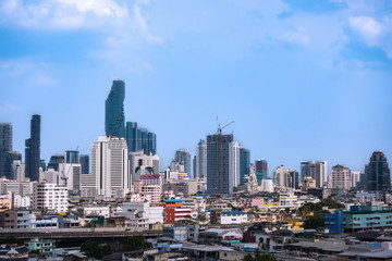 Fototapeta na wymiar business cityscape area and modern building city and transportation urban area and blue sky of bangkok thailand