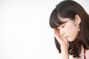 Young woman suffering from a headache