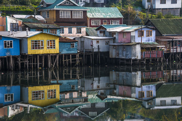 Palafito houses above the water in Castro, Chiloe, Chile