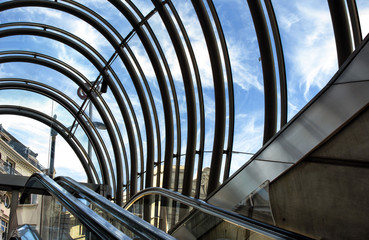 Bilbao Spain Subway Glass Entrance. Glass canopy is designed to bring in natural light. Designed by architect Norman Foster, the subway should be appreciated as a tourist attraction.