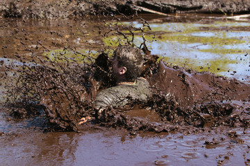 Mud race runners extreme run action sport  