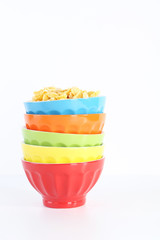 Bowls with cornflakes isolated on a white