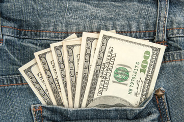 American dollar bills in pocket