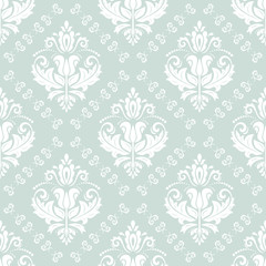 Damask classic light blue and white pattern. Seamless abstract background with repeating elements. Orient background