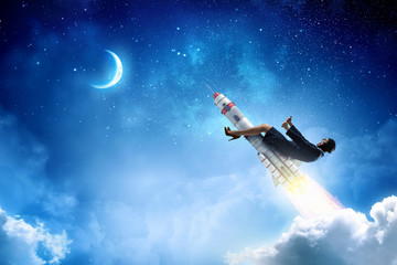 Obraz premium Woman riding missile . Mixed media