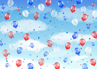 group of red blue white helium balloons on a sky