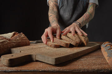 Baker Holds Bran Bread