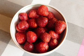 Strawberries in a dish for business lunch. Closeup for background