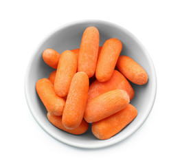 Fresh baby carrot in bowl on white background