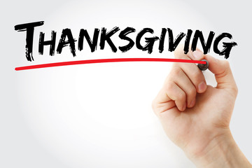 Hand writing Thanksgiving with marker, concept background