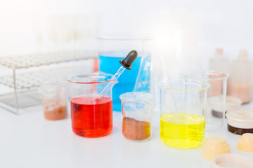 scientist hand holding laboratory test tube, science laboratory research and development concept