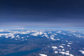 Fototapeta na wymiar Aerial view from plane over earth