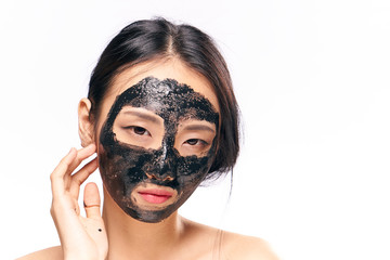 Facial, woman in cosmetic mask on isolated background
