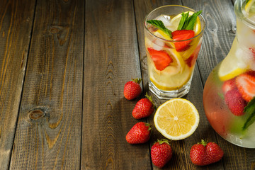 Lemonade with lemon and strawberry, mint and ice