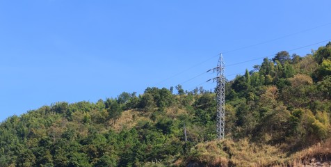 Obraz premium high voltage pole on the moutain