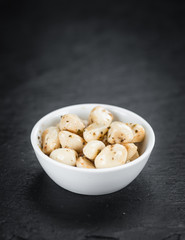 Some Marinated Garlic on a dark slate slab